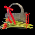 A hug with red tulips